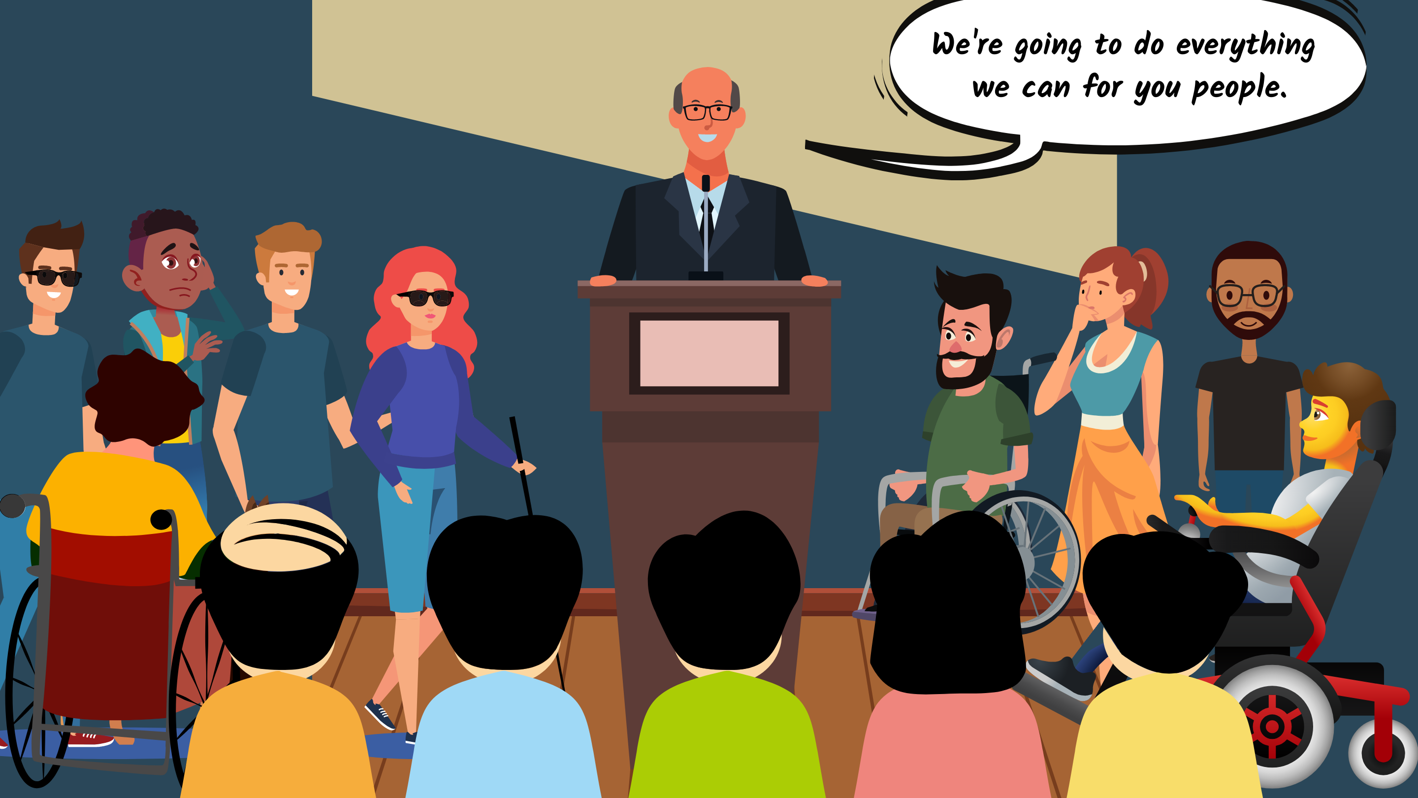 A man speaking at a lectern, surrounded by males and females, of various races and ages, some of whom have visible disabilities:  one person using a white cane, three people using wheelchairs.
				